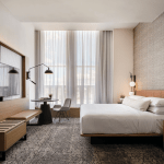 interior hotel room of bed and window