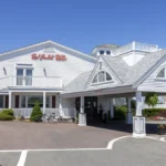 Exterior of hotel with white facade